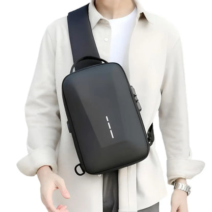 person wearing black mega anti theft crossbody bag with built in lock and USB port across their chest