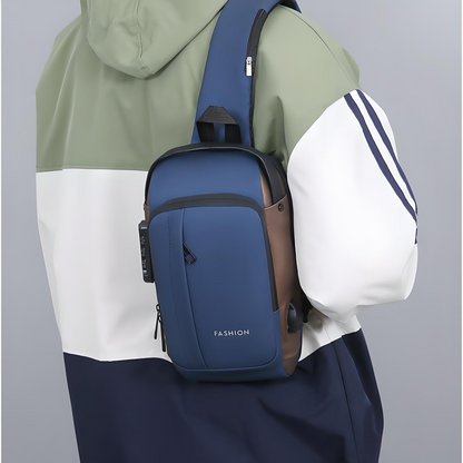 Person wearing a blue anti-theft crossbody bag with multiple pockets, a built-in lock, and an external USB port around their shoulder.